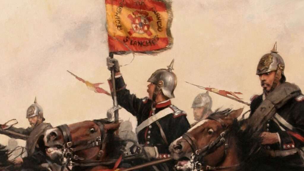 Soldados del Ejército español montados a caballo cargan contra el enemigo guiados por la bandera rojigualda